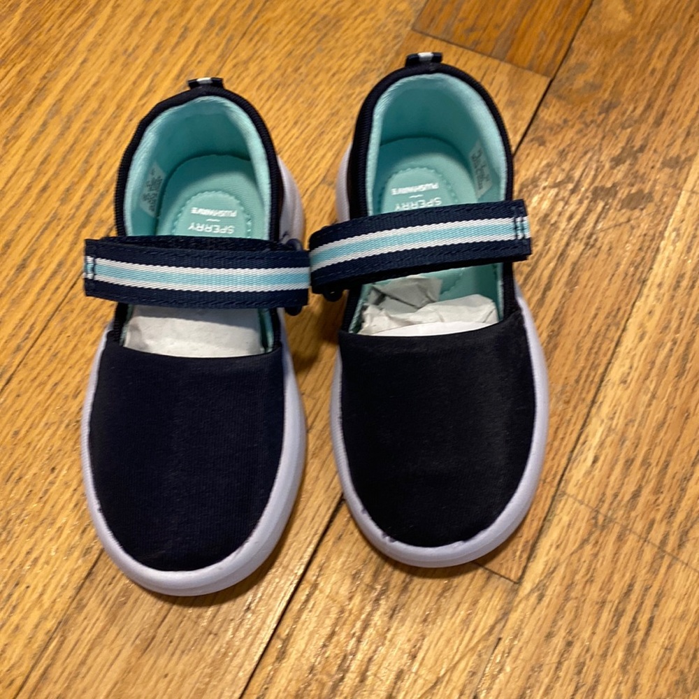 Never been worn, toddler size 5 Sperry shoes.
